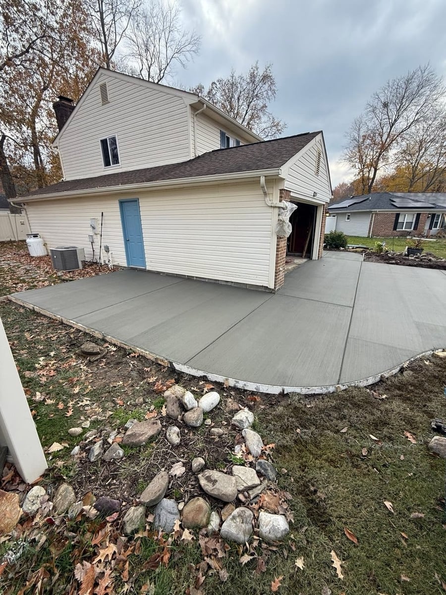 Wraparound concrete driveway with curved finish — Hampton Roads, VA